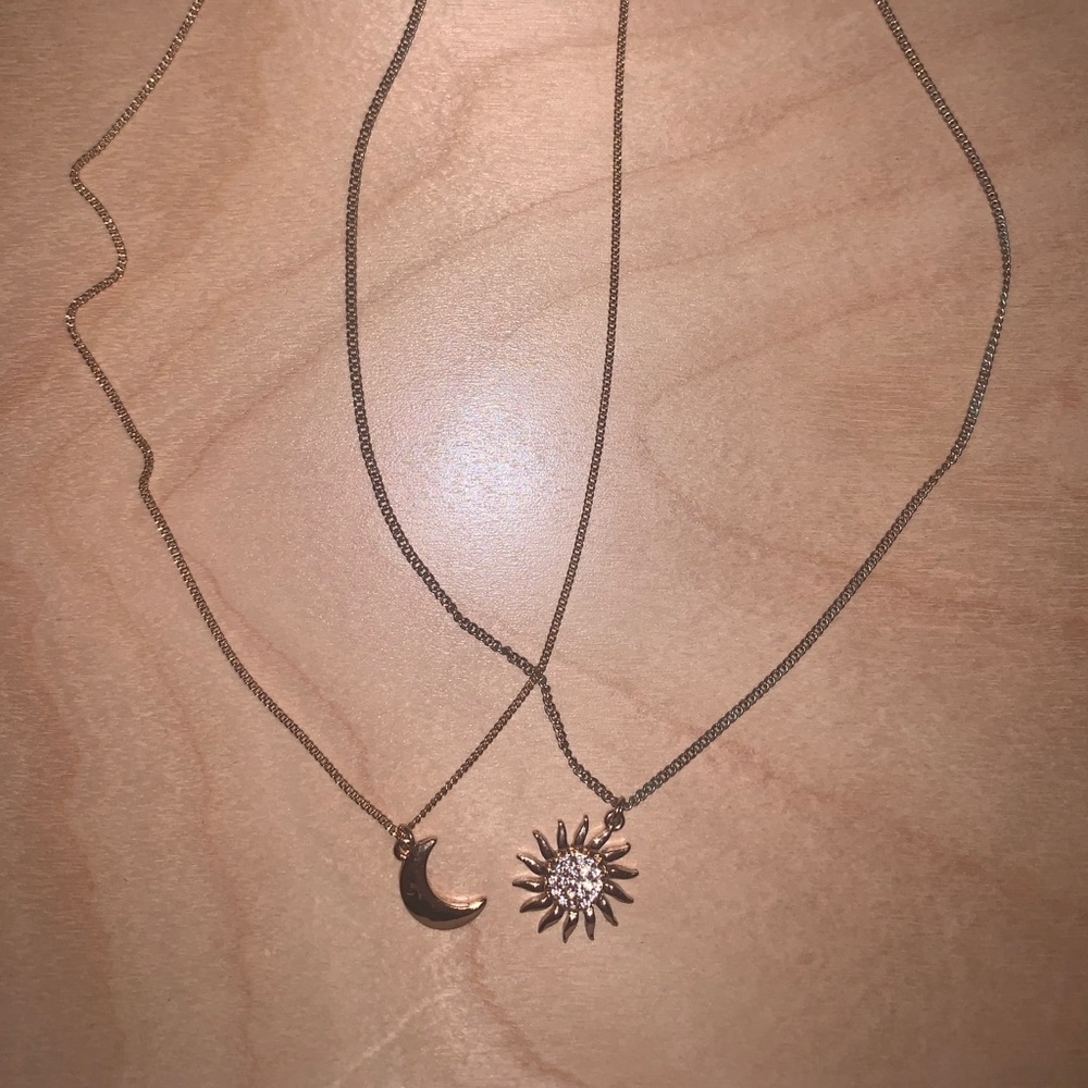 Sun and moon charm duo